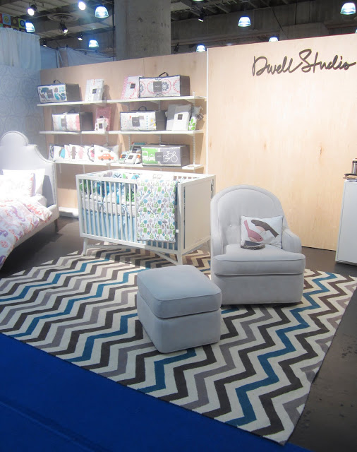 multicolored brown, blue and taupe chevron rug in Dwell Studio's booth at the New York International Gift Fair