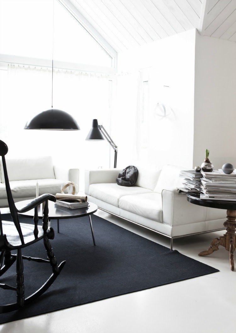 White minimalist living room with black accents