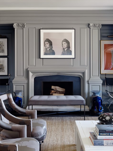 Gray living room with traditional wall moulding