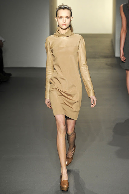 model wearing a light brown turtleneck dress from Calvin Klein's Fall Ready to Wear 2011