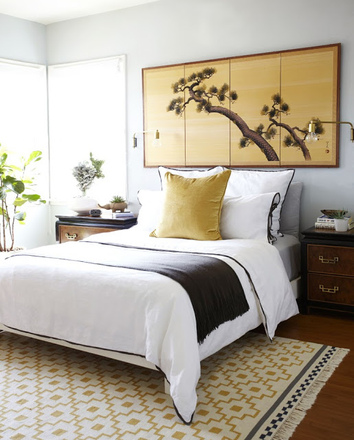 Elegant bedroom gold Chinoiserie screen white bedding brown trim