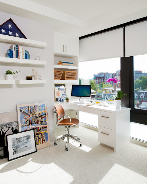 White home office with floating shelves and an amazing view of Washington, DC