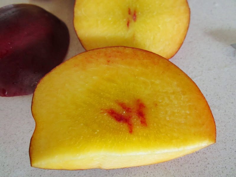 Close up of some cut nectarines
