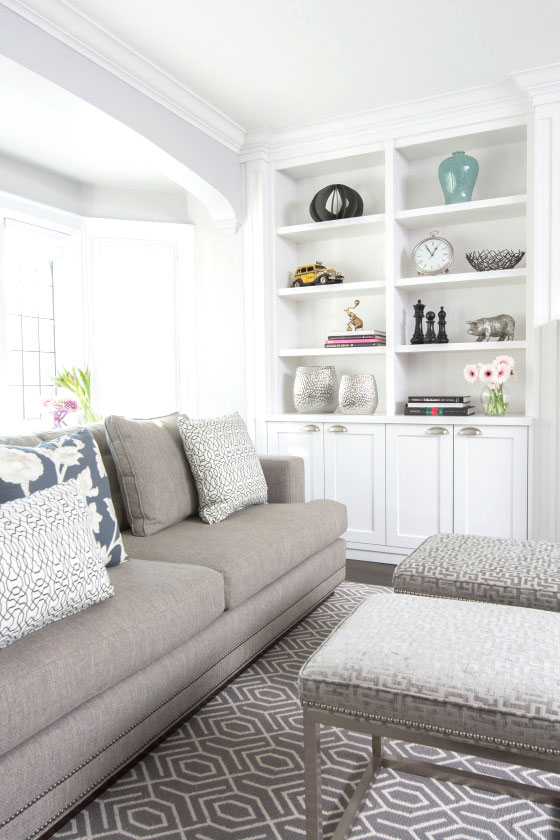 Grey living room with graphic print ottoman