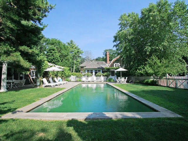 backyard and pool of a house in the Hampton's 