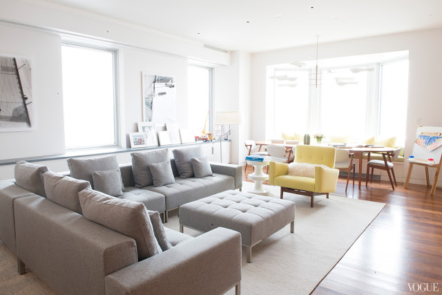 white gray color palette interior design grey sectional sofa yellow side chair modern new york city apartment house vogue