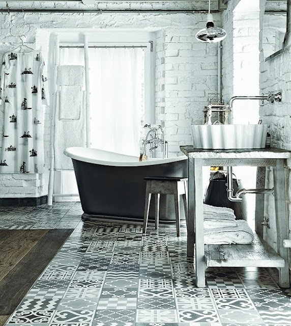 rustic white and grey bathroom with painted bricks
