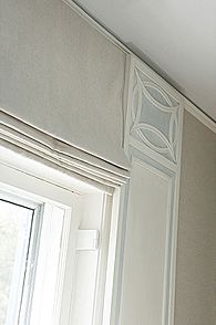 Close up of the moulded detailing in a grey bedroom