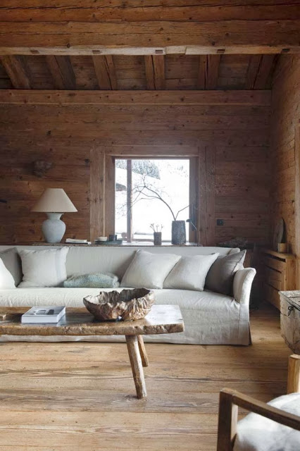 Fully wood paneled mountain house with a window seat