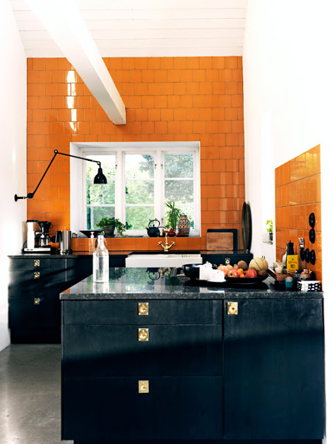 kitchen orange ceramic wall tiles black cabinetry cabinets gold drawer pulls knobs