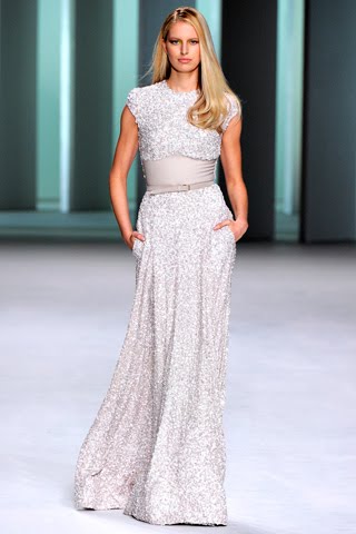 Sparkly sleeveless dress from Elie Saab's Spring 2011 fashion show with a light grey belt