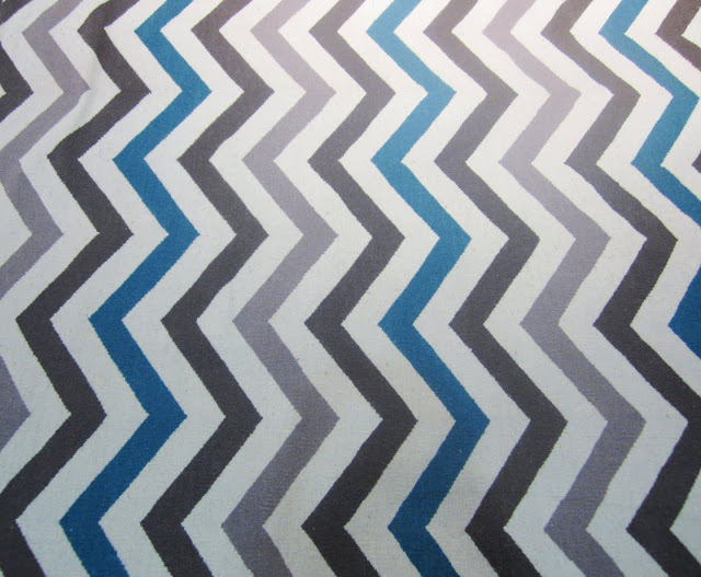 multicolored brown, blue and taupe chevron rug by Dwell Studio
