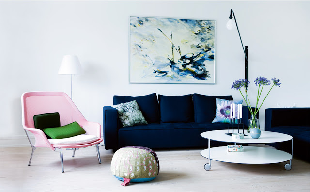 living room blue velvet sofa pink side chair oval white coffee table modern home decor design
