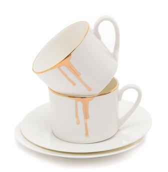Drip gold and white coffee mugs