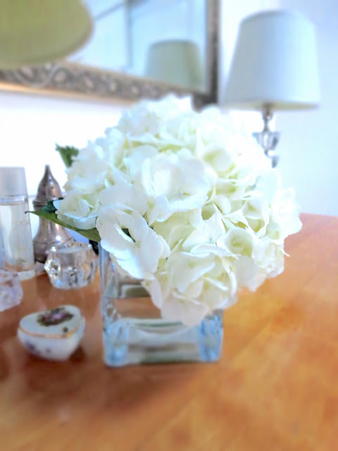 white hydrangea on COCOCOZY bedroom dresser flowers mirror lamp