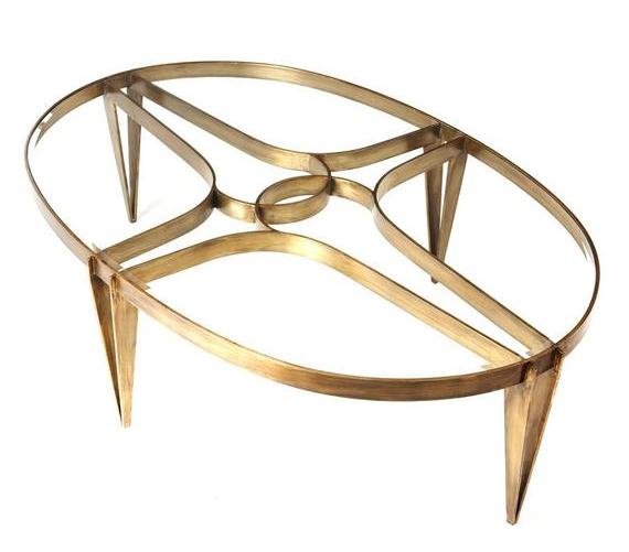 Oval coffee table in solid brass with beveled glass top