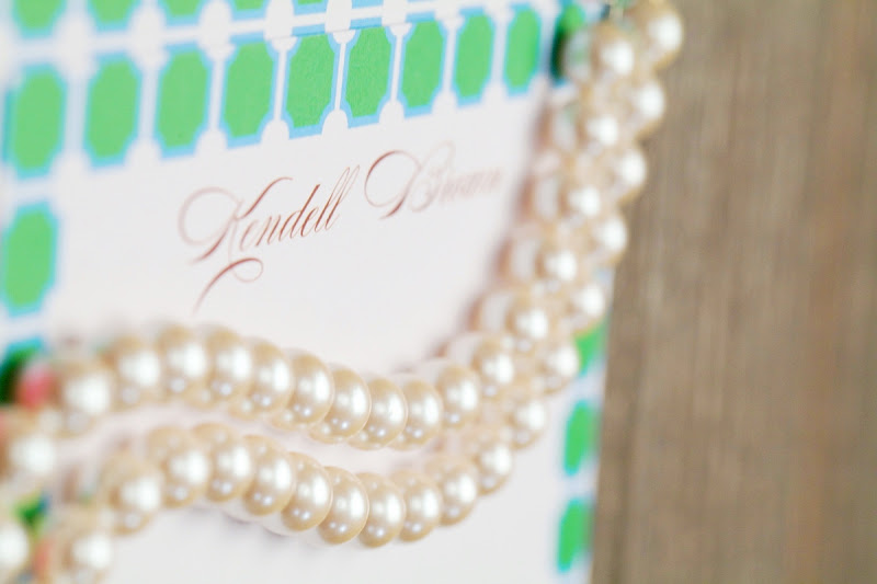Close up of pearl necklace on Kalyn Johnson Chandler's Nantucket stationary