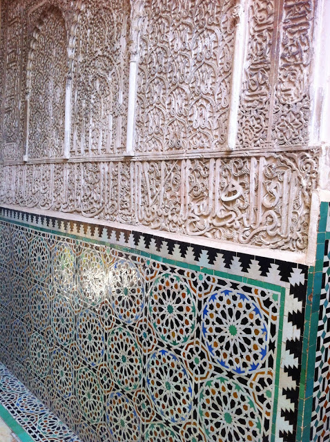 Beautiful wall in Morocco with carvings and tiles