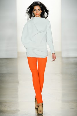 Model wearing orange skinny jeans from Costello Tagliapietra's Fall 2011 runway show
