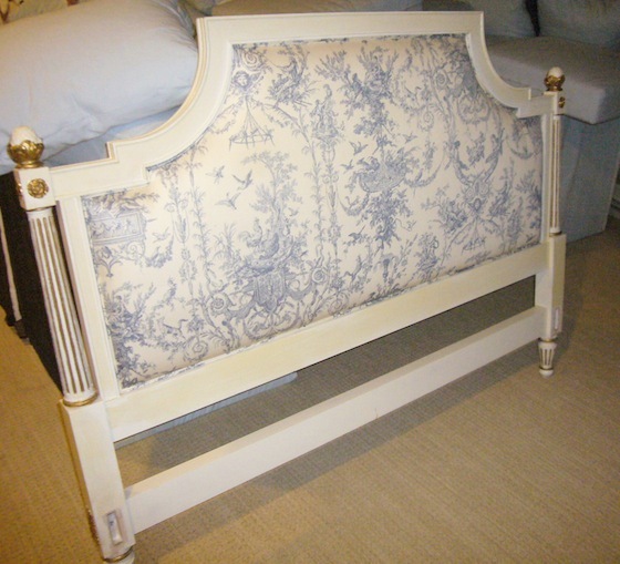 Before makeover: a toile headboard with gold edges