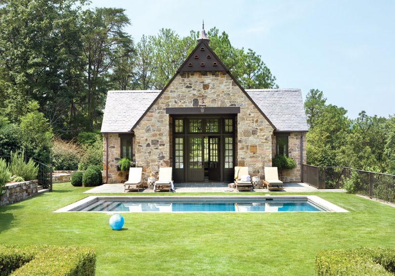 Exterior of a stone pool house