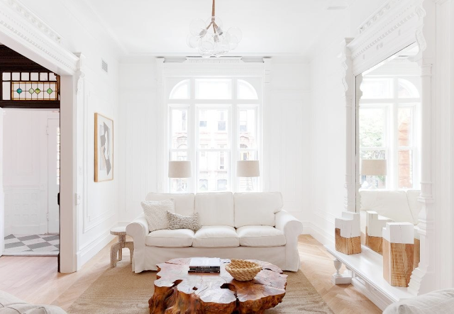 White living room with tree trunk table