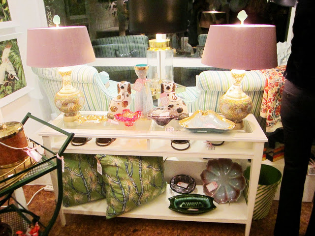 A well edited selection of vintage finds including two striped armchairs and vintage lamps displayed in Chic Shop 