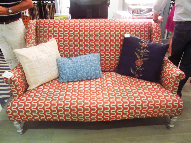 Orange, white and brown graphic printed settee