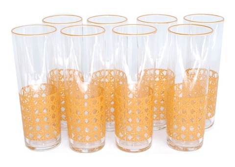 8 vintage glasses with orange cane pattern on the bottom third and orange rims