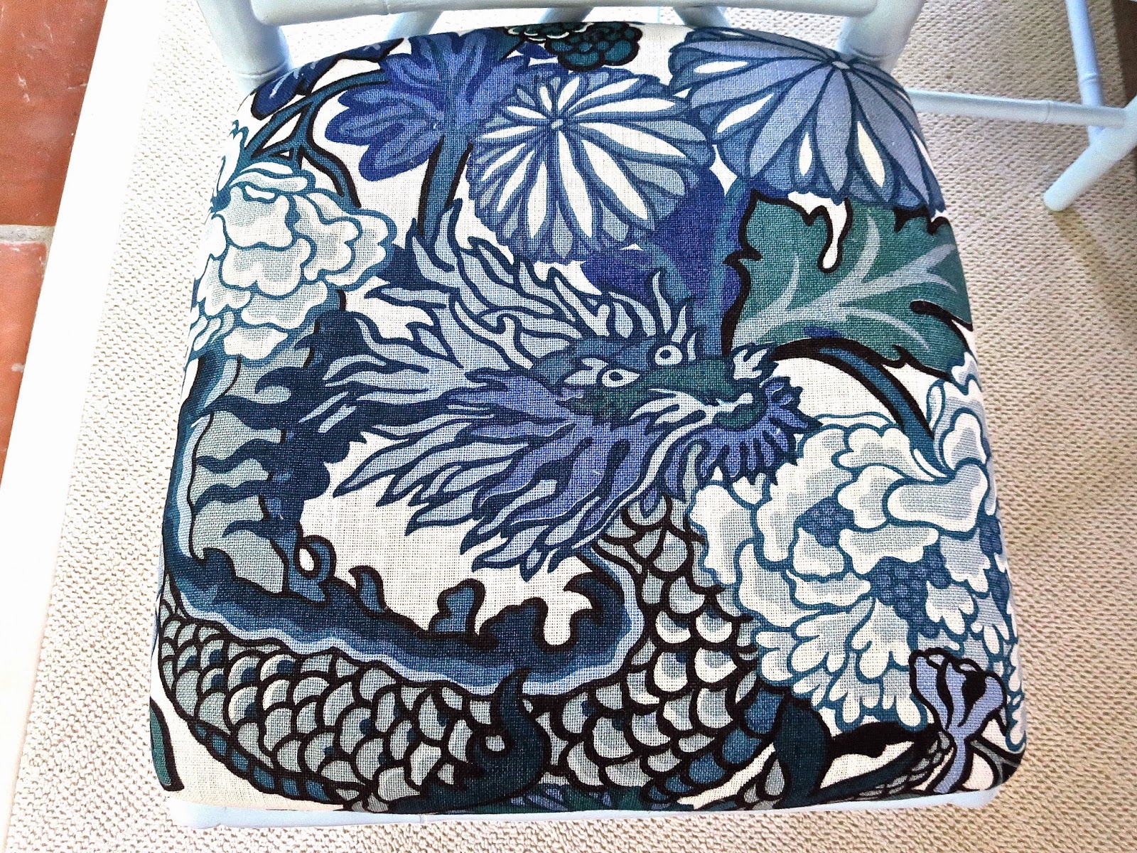 Chiang Mai Dragon fabric from Schumacher China Blue on seat cushion