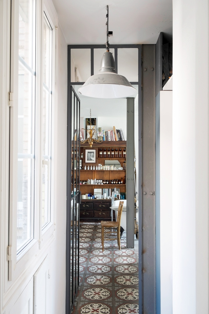 Hallway with cement tile floor in a Paris home