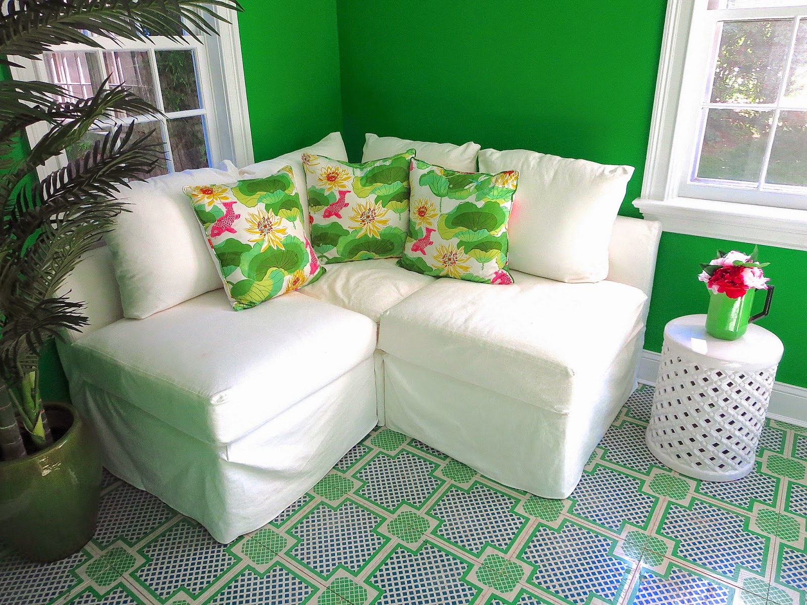 white corner sofa sectional seating painted wood tile floors