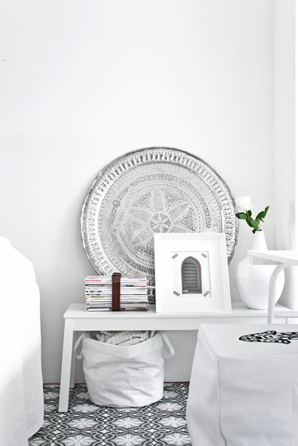 white living room with black and white moroccan tiles close up