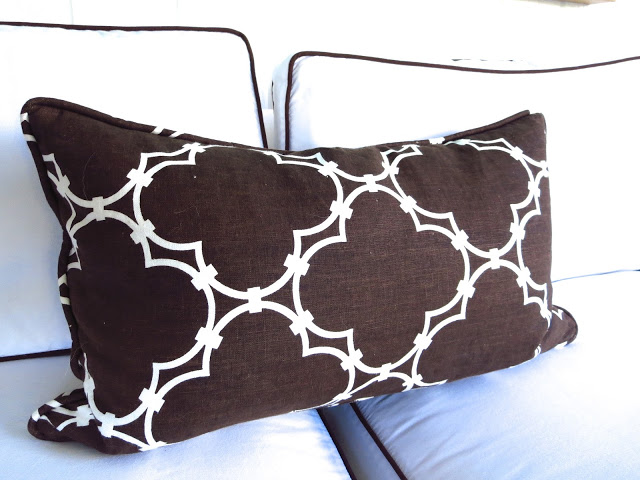 COCOCOZY Quatrefoil pillow on a white sofa with brown trim in Coco of COCOCOZY's living room