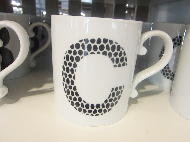 Close up of the "C" mug