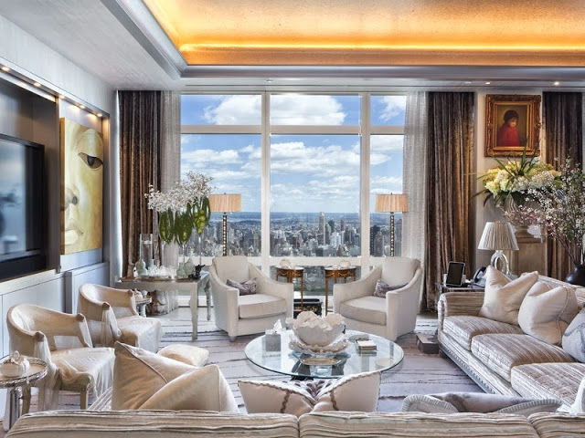 Living room in a NYC penthouse with a view of the city