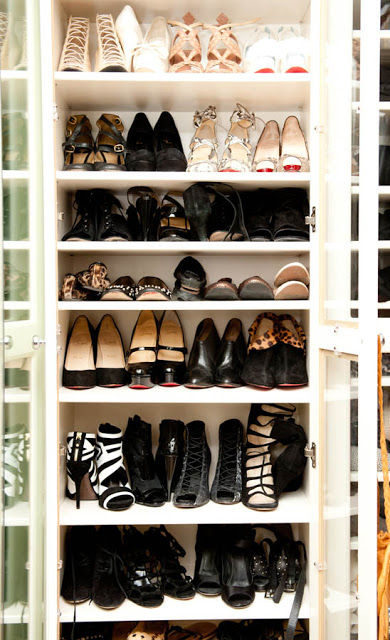 Shoe shelf with a glass front to show of her fantastic shoe collection