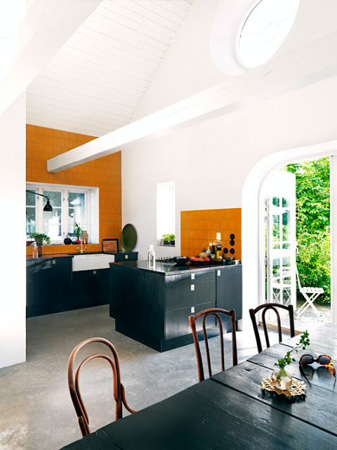 open kitchen dining area orange black small kitchen french doors high ceilings