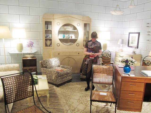 Liz O'brien booth filled with vintage mid century classic furniture
