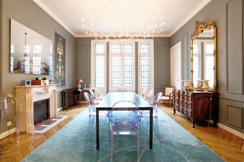 Dining room in a Paris townhouse with ghost chairs