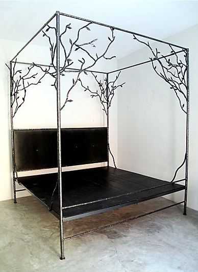 Cassamidy metal canopy bed with plant detailing