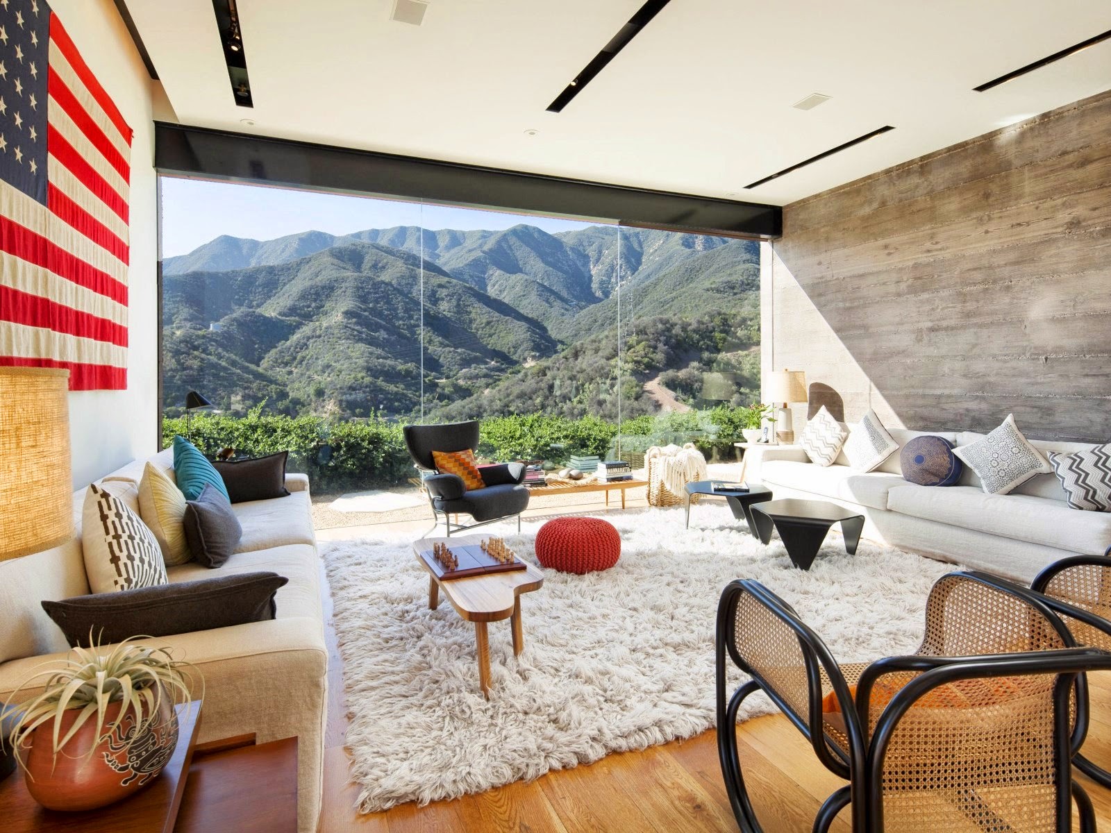 Contemporary living room with floor to ceiling window in California