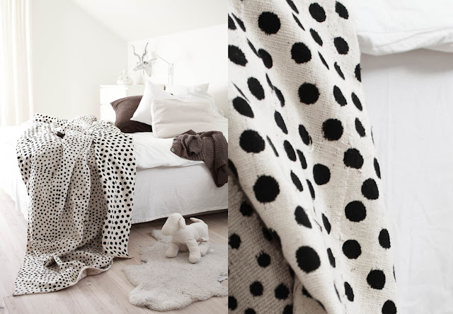 White bedroom with ikata polka dot duvet cover
