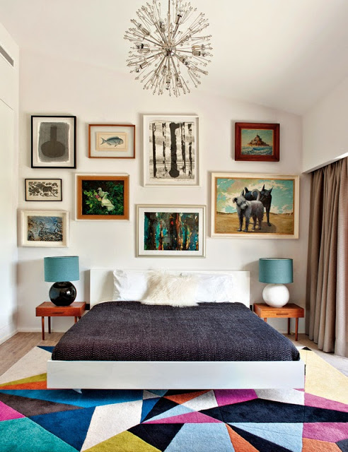 Bright graphic print rug in a bedroom