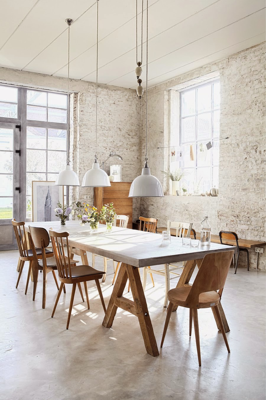 Bright dining room with mismatched chairs