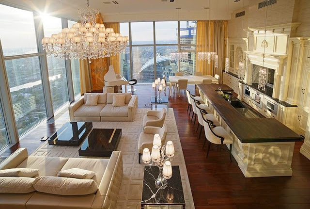 Multi million dollar Russian apartment with floor to ceiling windows and crystal chandelier 