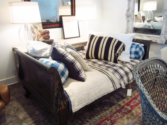  sleigh bed is with plaid, stripe and buffalo plaid/oversized gingham check pillows and bedding