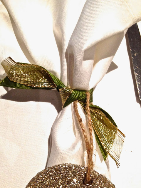 Napkins tiled with gold and green grosgrain ribbon