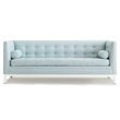 Light blue tufted sofa from Jonathan Adler