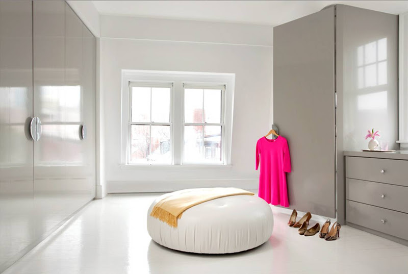 Sleek modern dressing room with glossy grey cabinets